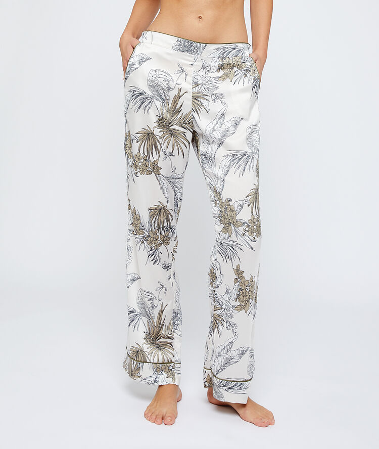 Trousers with print on the sheets white.